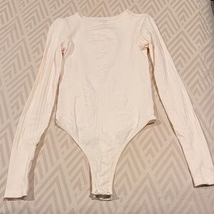 Pale Pink Long Sleeve Bodysuit - size M/L